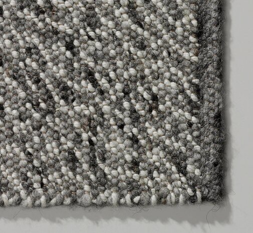 beside rugs tweed grijs