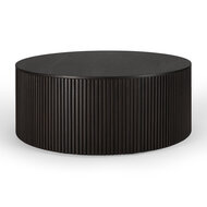 De ronde Roller Max koffietafel, ontworpen door Jacques Deneef, is een slim multifunctioneel item dat een koffietafel combineer