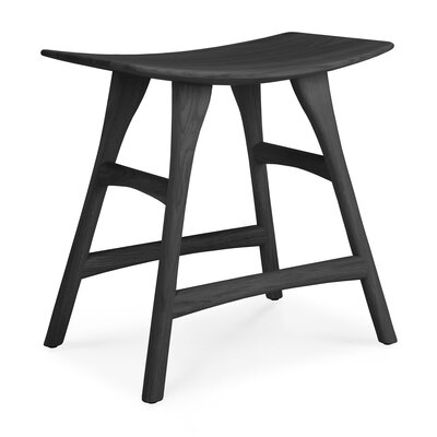Ethnicraft Oak Osso stool low black with a varnish finish.